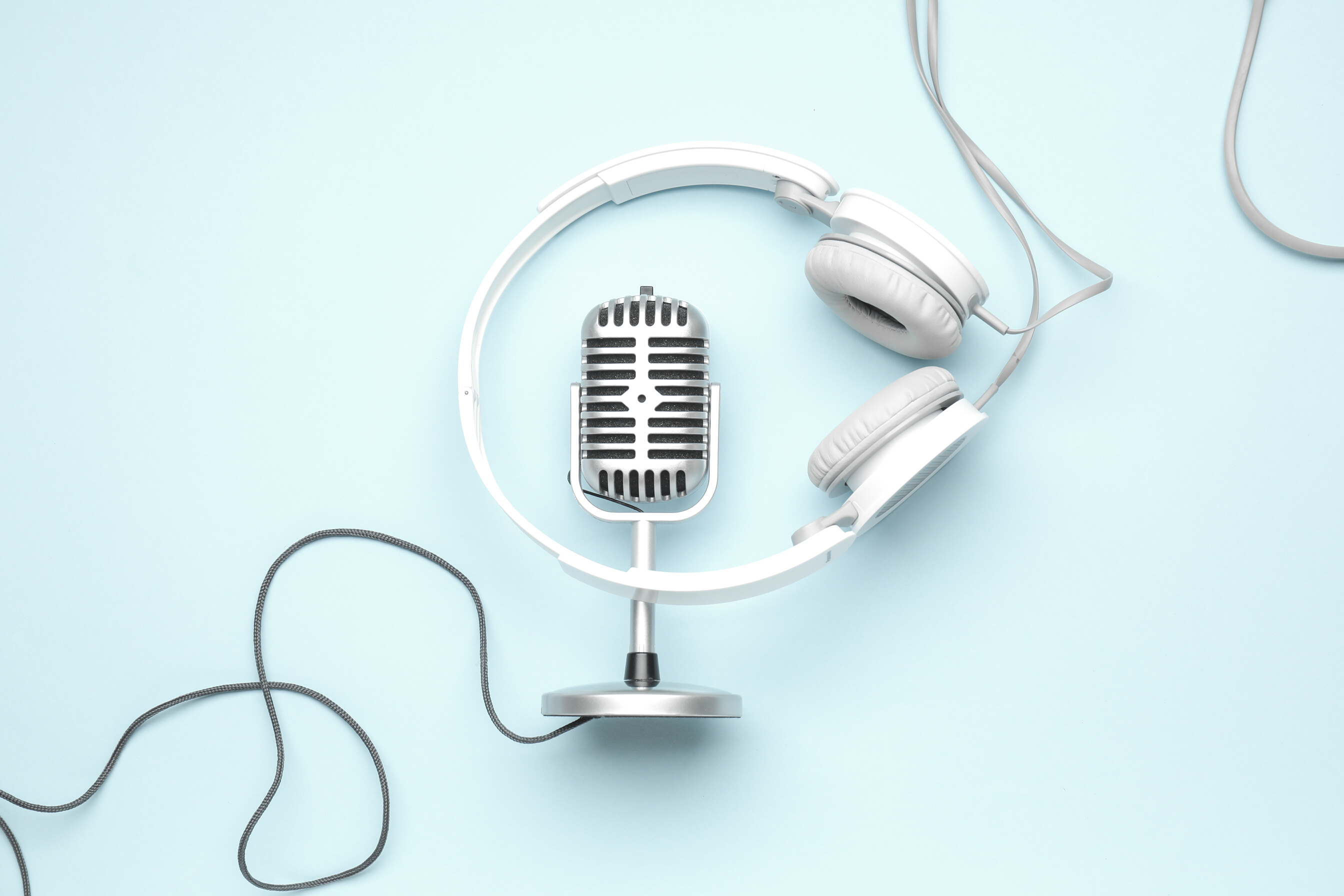 Headphones with Microphone on Color Background